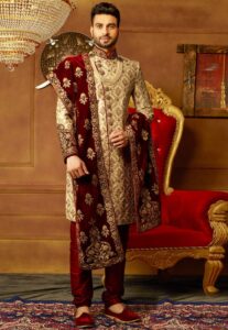 Traditional gold and maroon wedding dress for groom